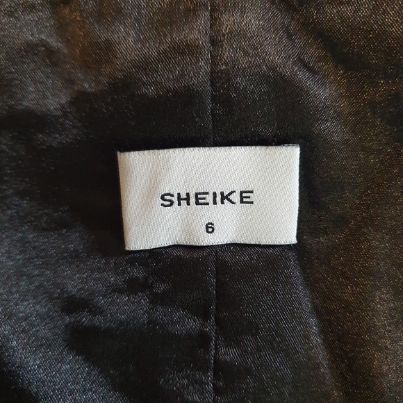 NWOT Sheike embroided floral mini peplum dress Sze 6 Black bodycon ruffle - Picture 11 of 11